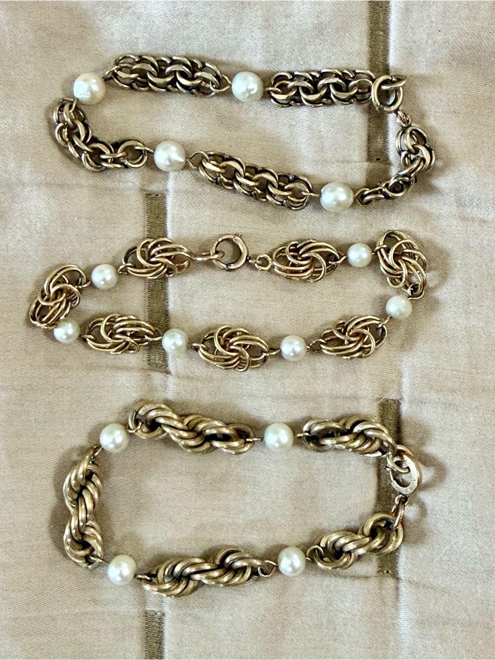 Vintage MCM 3 x gold-toned chain and faux pearl costume jewelry bracelets.